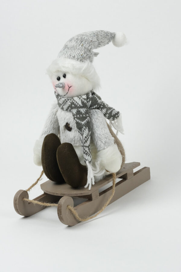 snowman on a wooden sled balooworld-decoration